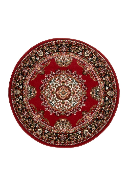 Circular rug in rich red tones for elegant interiors.