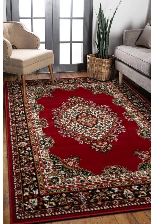 Bold red rug adding warmth and character to interiors.