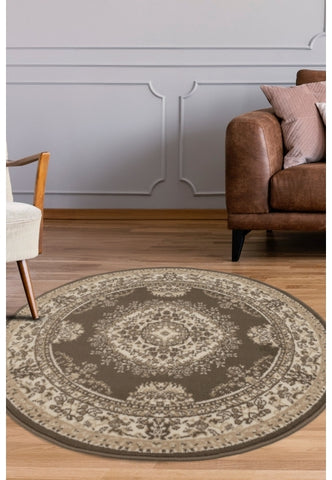 Round taupe rug with timeless traditional design.