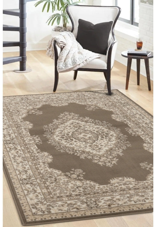 Taupe rug with timeless traditional design.