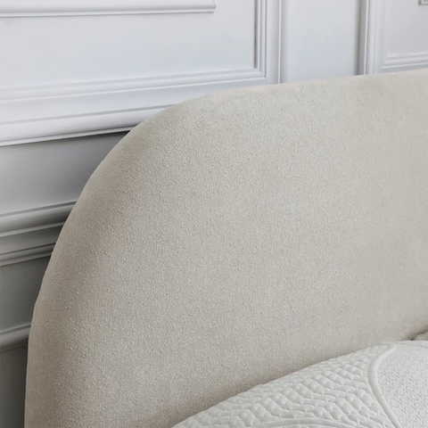 Close Up of Headboard on the Mallow Fabric Upholstered Bed with Walnut Legs