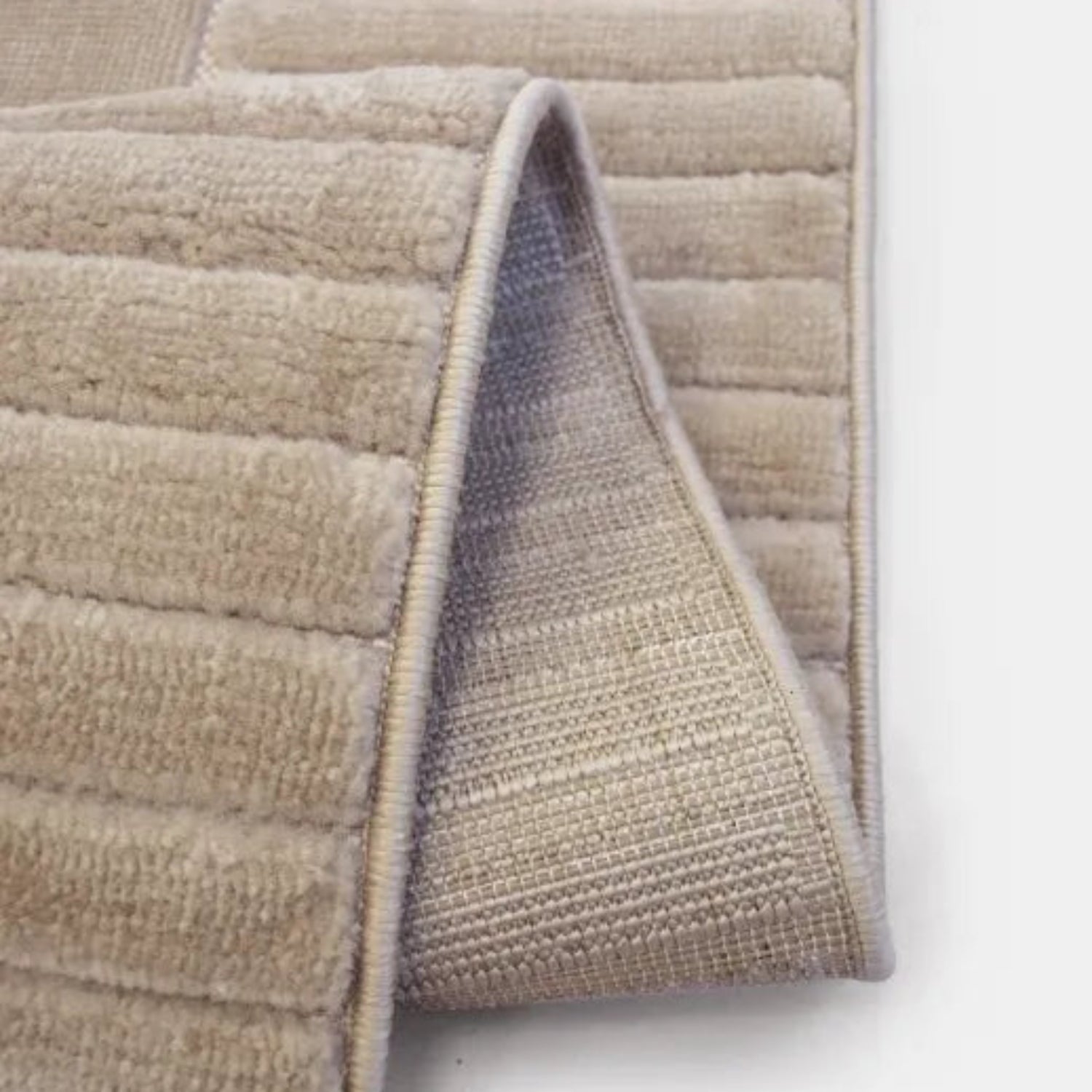 Durable synthetic rug with long lasting performance.