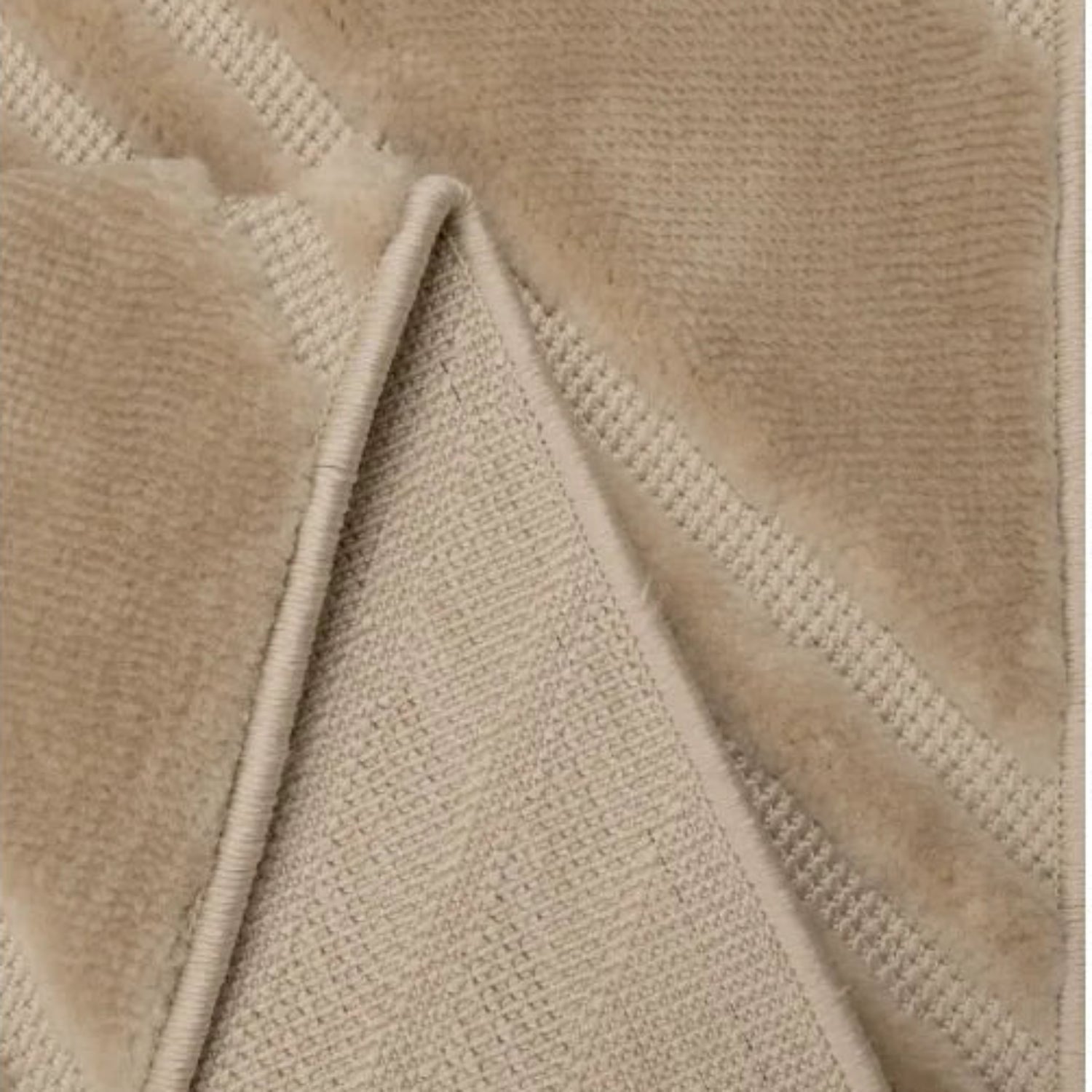 Machine woven rug with durable and easy care fabric.