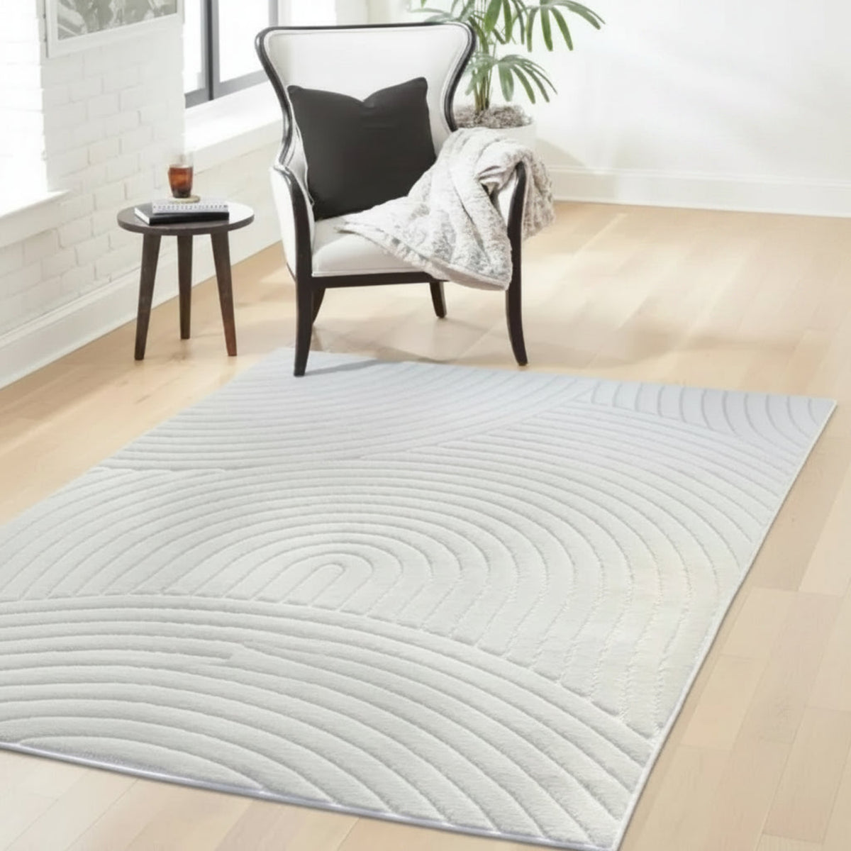 Modern rug with flowing curved pattern and subtle design.