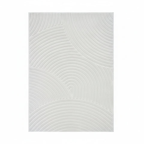 Textured rug with curved pattern and 3D effect.