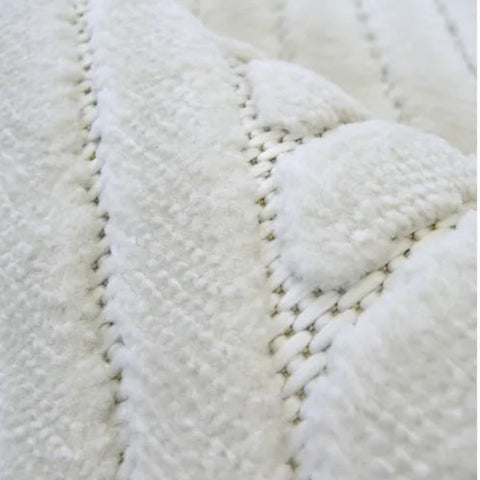 Neutral rug with soft abstract curved design.