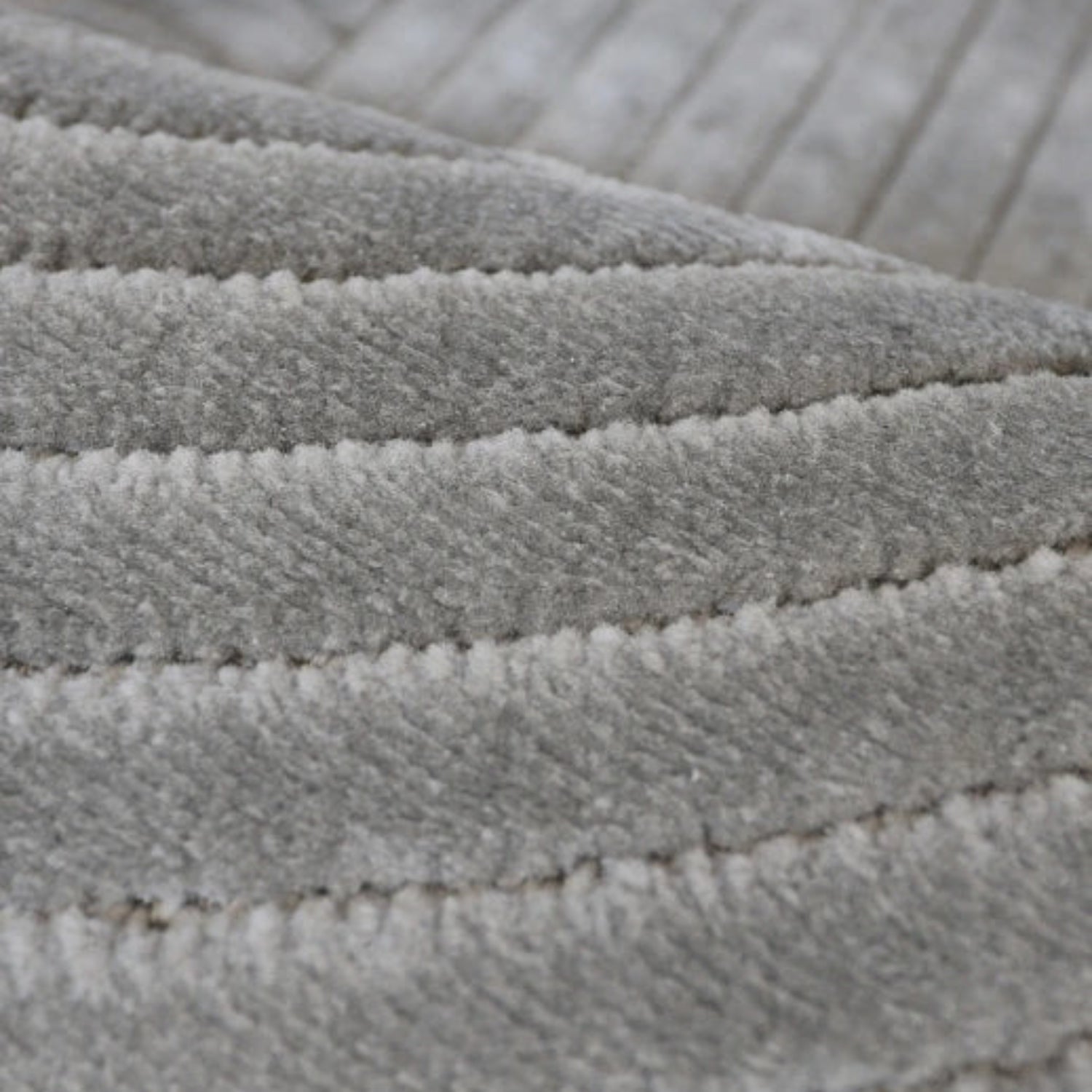Stylish rug with detailed knot pattern and depth.