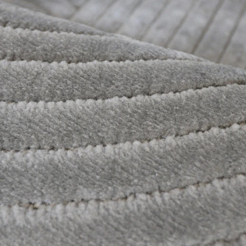 Stylish rug with detailed knot pattern and depth.