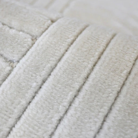 Machine woven rug with durable and easy care fabric.