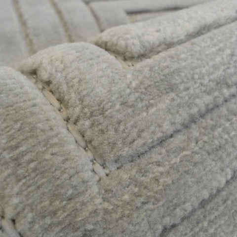 Stylish rug with structured square pattern.