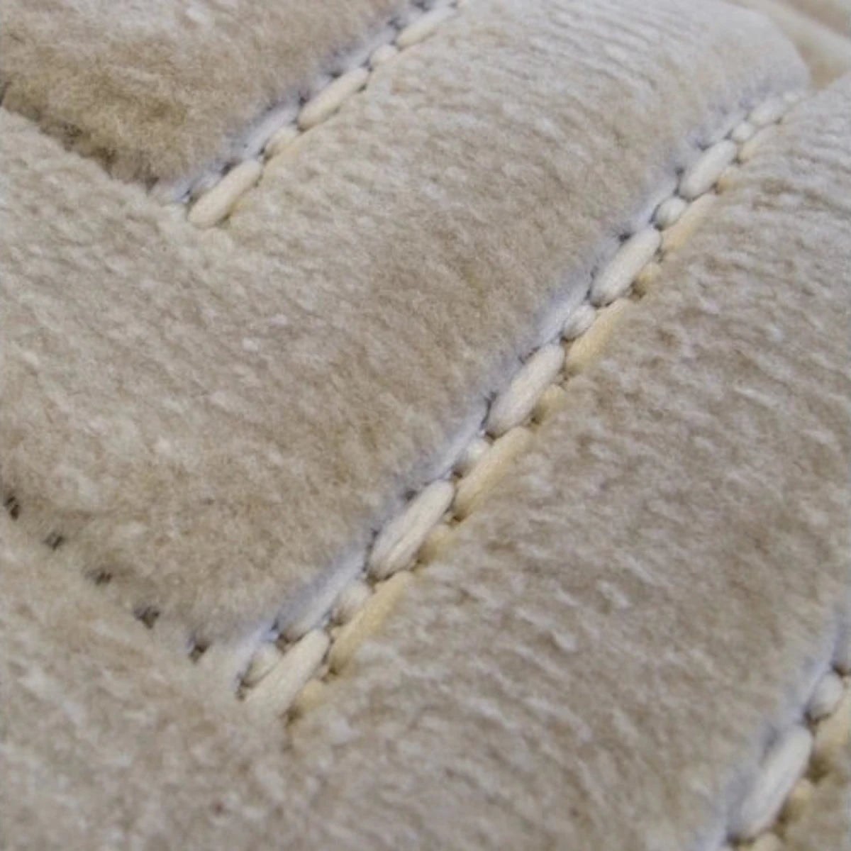 Stylish rug with structured square pattern.