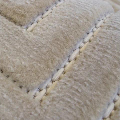 Stylish rug with structured square pattern.