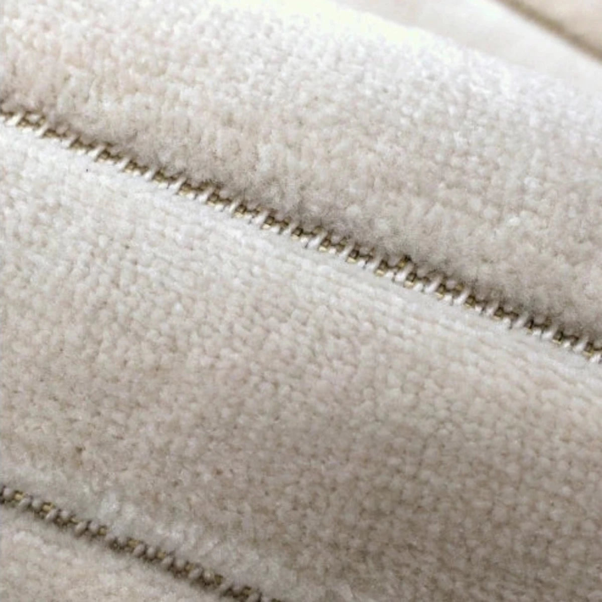 Stylish striped rug adding depth and softness.