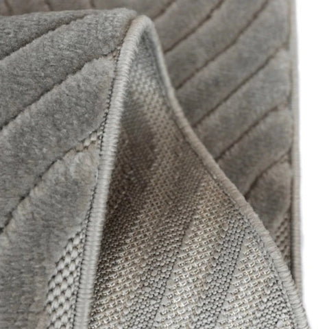 Contemporary rug with tone on tone  detailing.