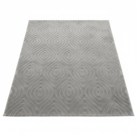 Grey rug with modern tear drop pattern and subtle design.