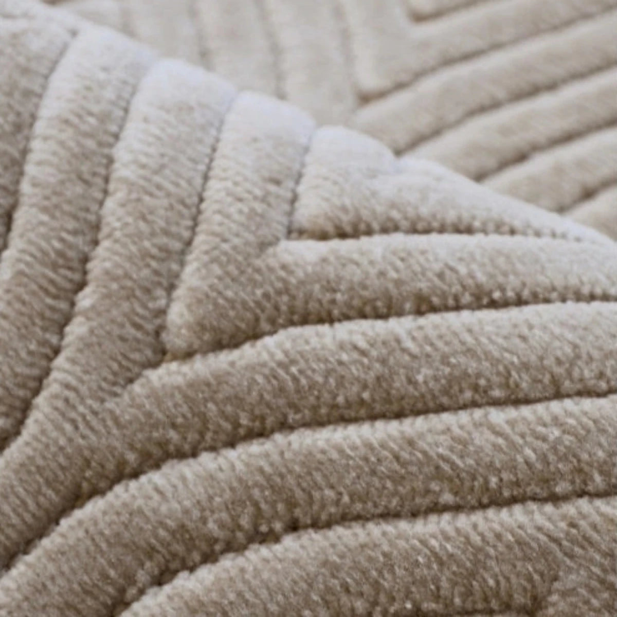 Textured rug with tear drop pattern and 3D effect.