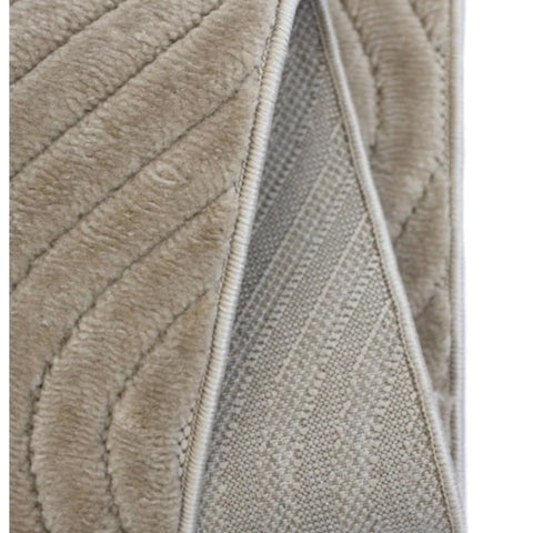 Contemporary rug with tone on tone teardrop detailing.