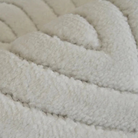 Contemporary rug with tone on tone teardrop detailing.