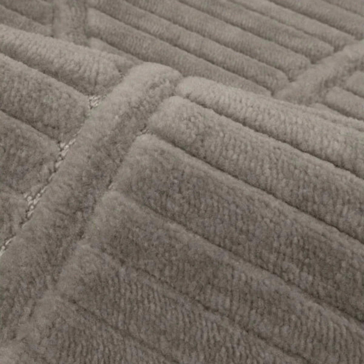 Modern grey rug with soft flowing wave design.