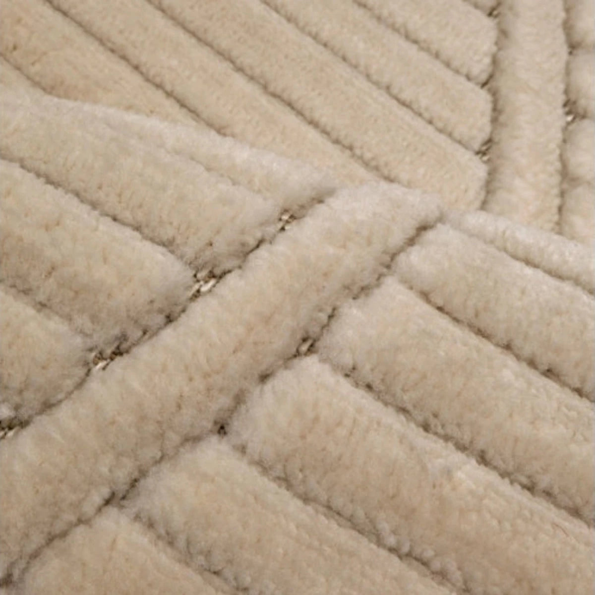 Contemporary rug with tone on tone wave detailing.