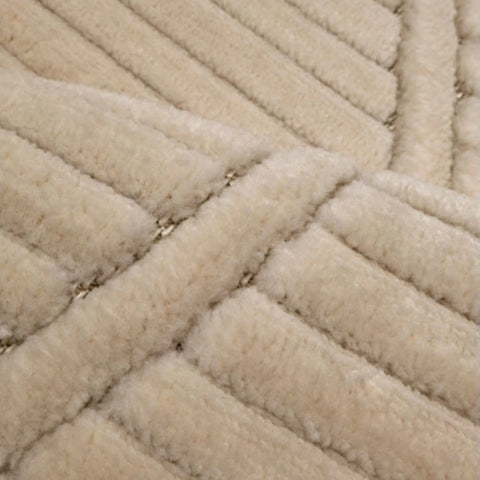 Contemporary rug with tone on tone wave detailing.