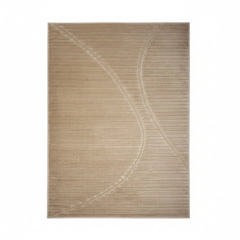 Stylish rug with wave inspired pattern adding movement.
