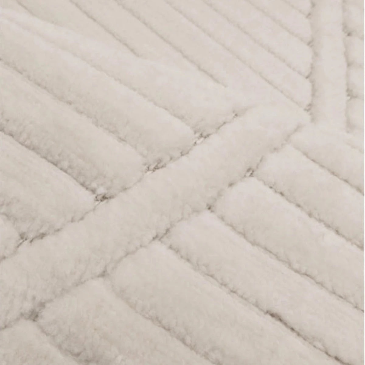 Contemporary rug with tone on tone wave detailing.