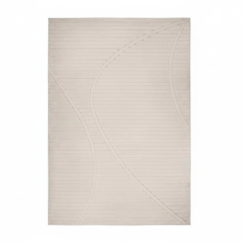 Textured rug with wave pattern and 3D effect.