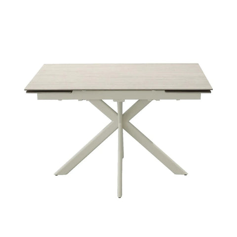 Modern beige dining table with geometric base