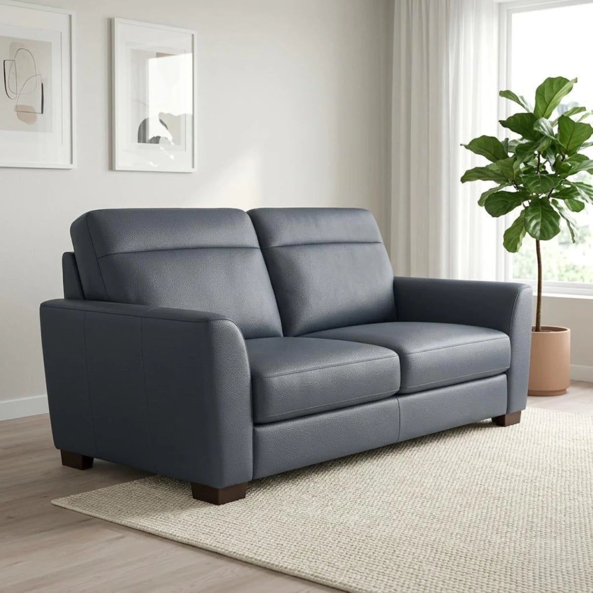 Modern 2 seater sofa with premium leather and strong construction.