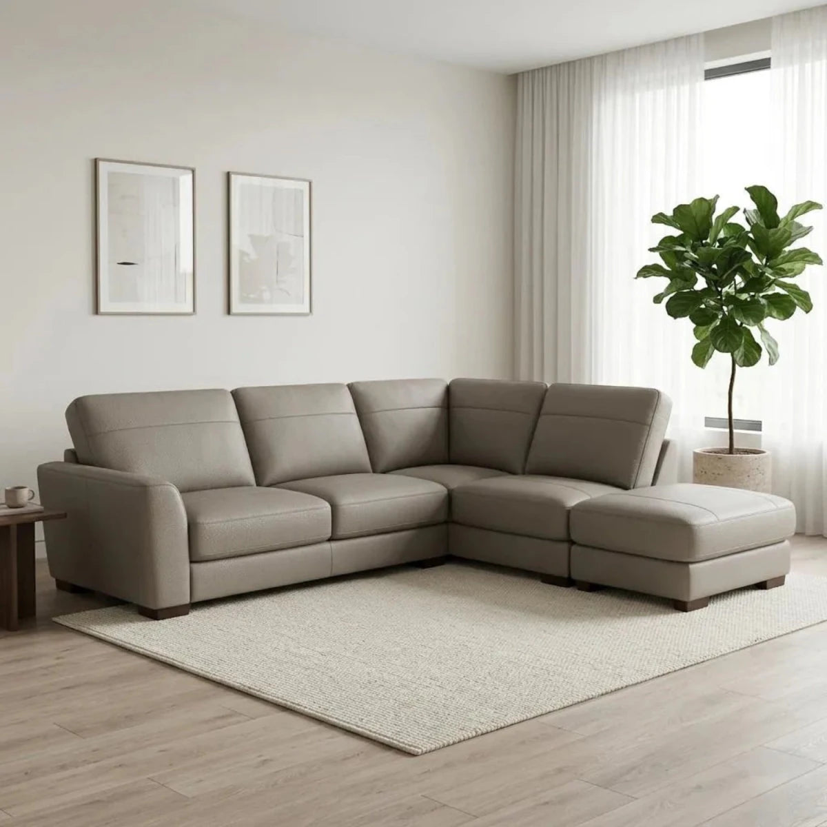 Large L-shaped leather sofa with supportive cushions and elegant finish.