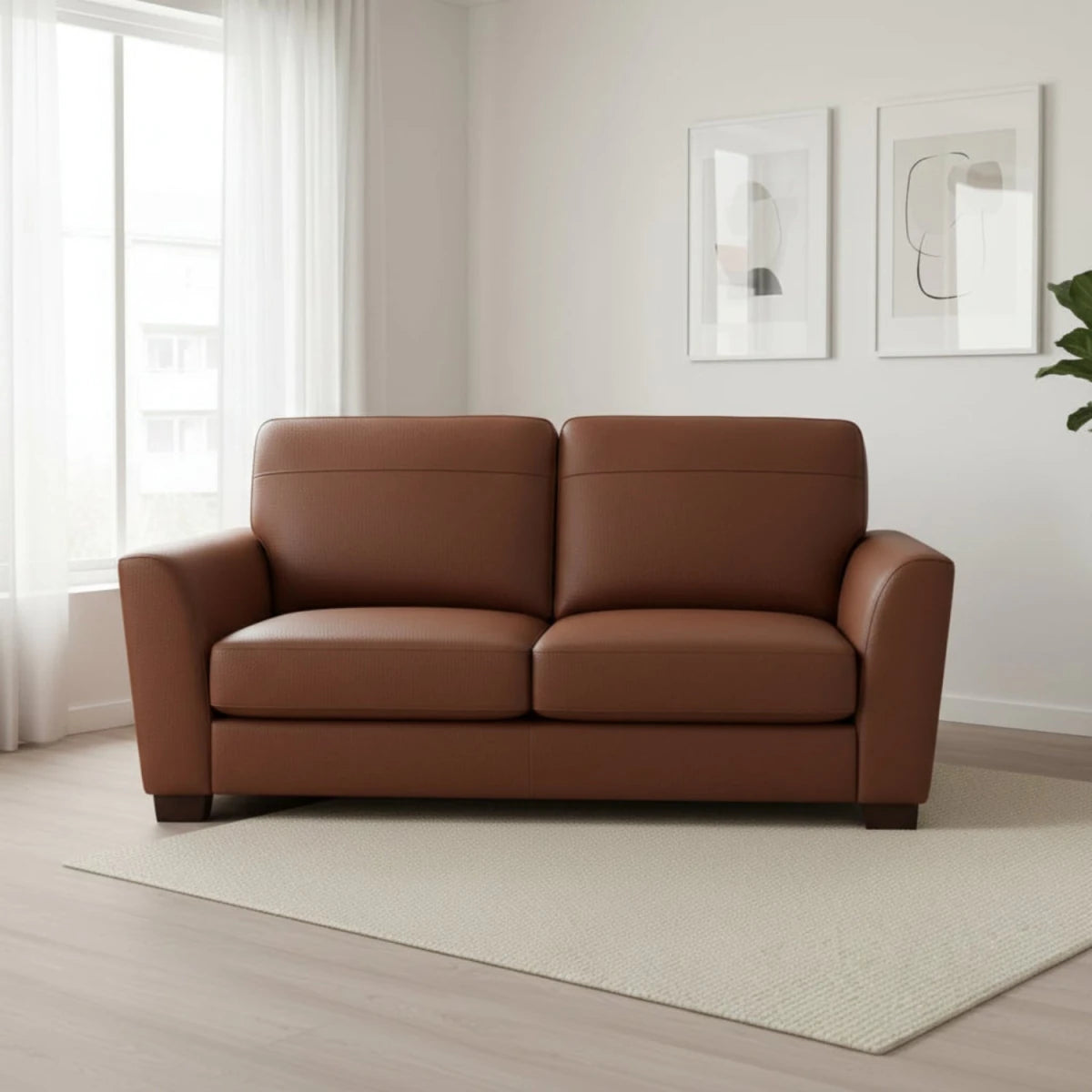 Stylish 3 seater leather sofa with serpentine spring support.