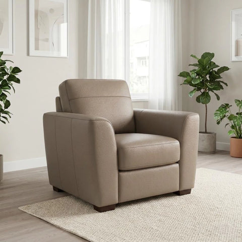 Contemporary leather armchair with refined design.