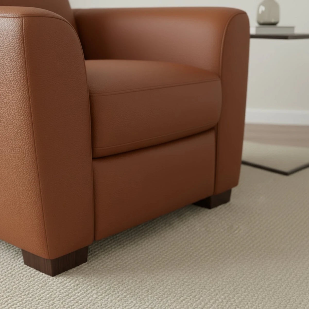 Minimalist sofa feet complementing modern leather design.