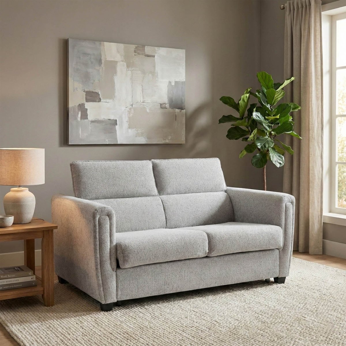 Shop the Mayfair fabric sofa bed in Ash or Beige. Features an easy pull-out bed mechanism, quilted mattress and compact modern design for everyday living.