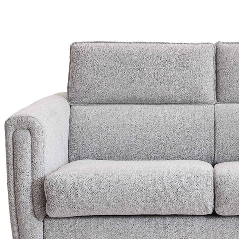 Close-up of a light gray textured fabric sofabed with a square back cushion, rounded armrest, and seat cushion on a white background.