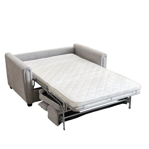 Gray sofa bed with mattress extended on a white background