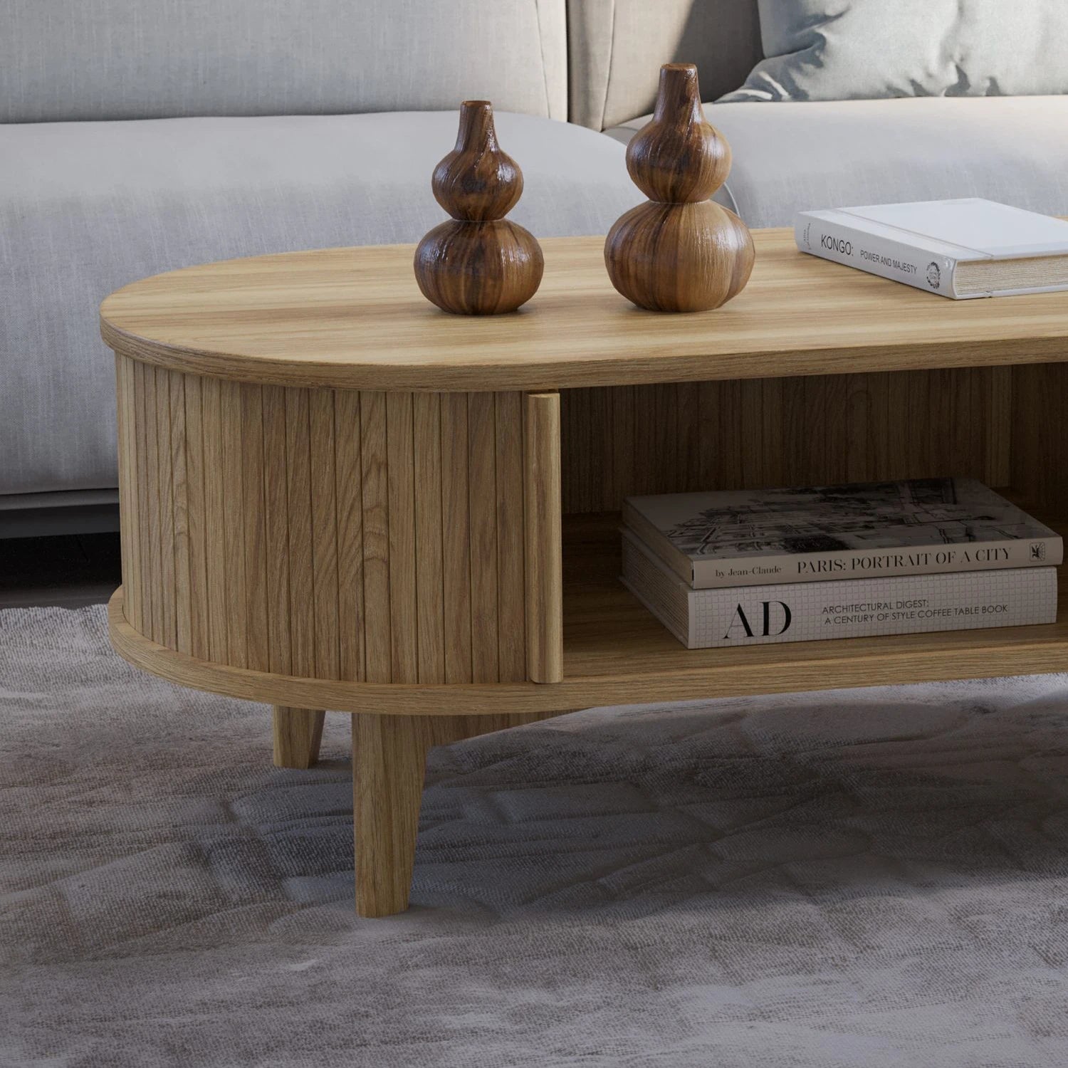 Wooden coffee table with decorative items in a living room setting