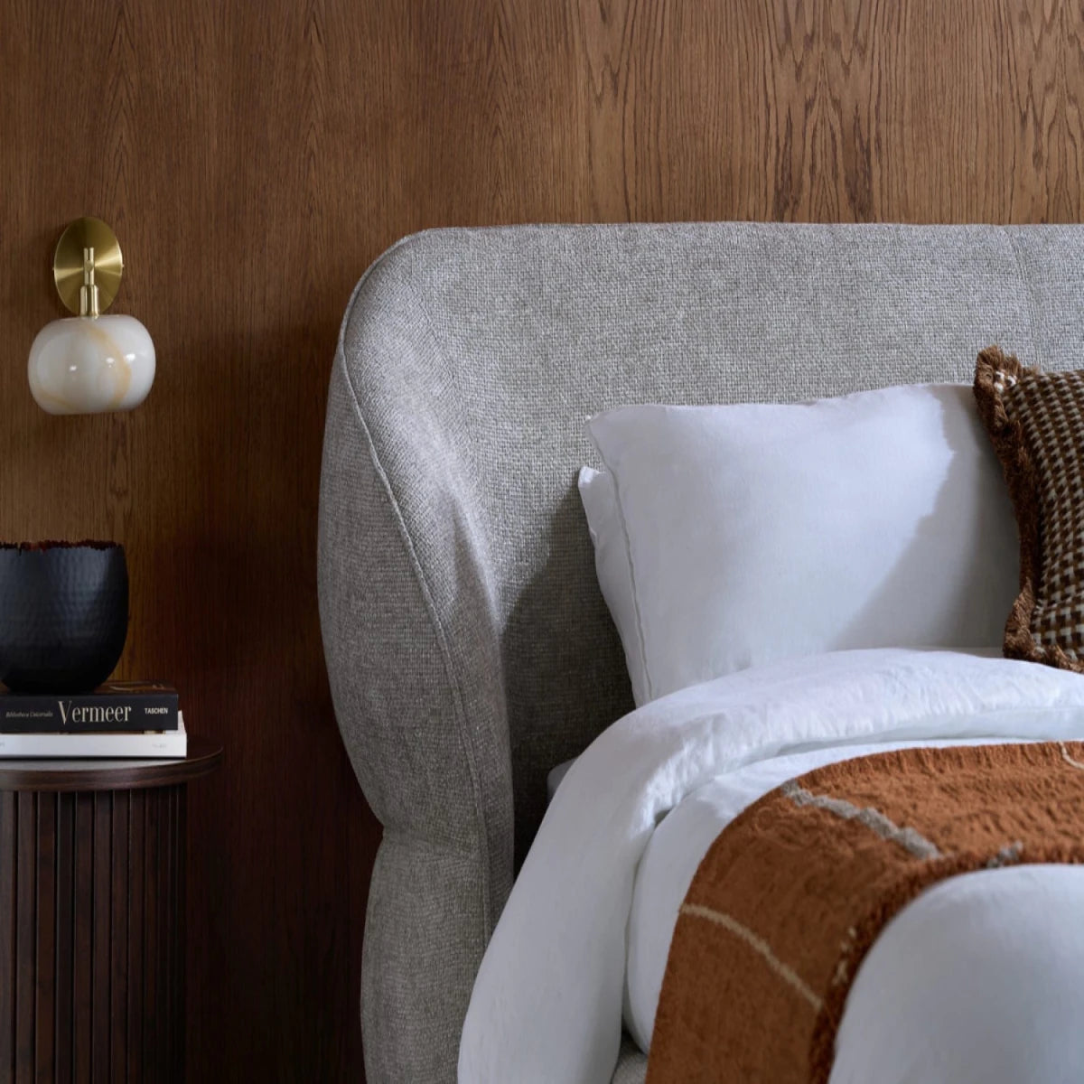 Luxuriously padded headboard for enhanced comfort.