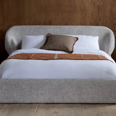 Stylish bed with soft curves and premium finish.