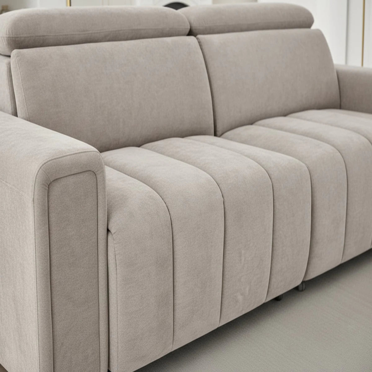 Luxury beige sofa bed with premium textured finish.