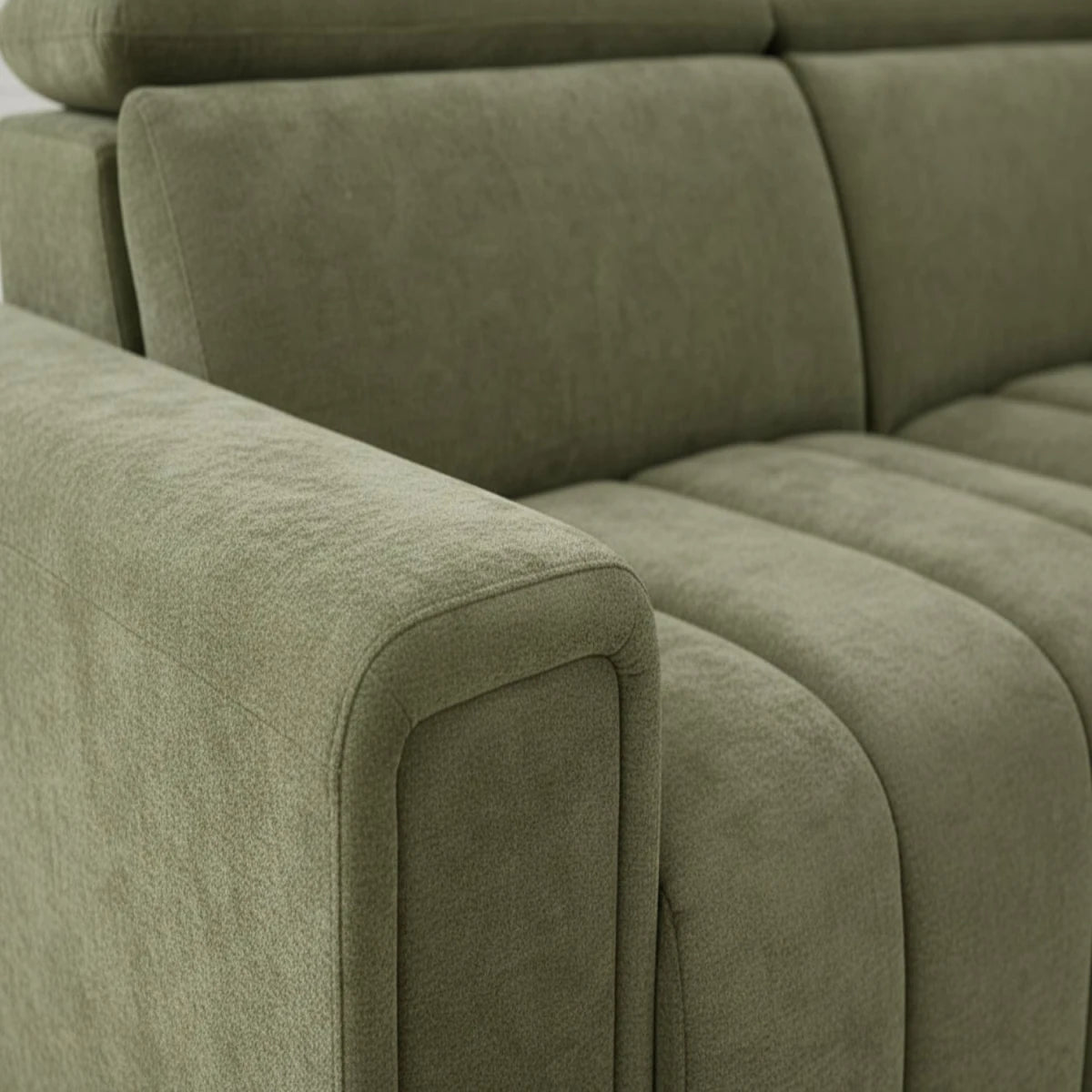 Rich green upholstered sofabed with premium modern finish.