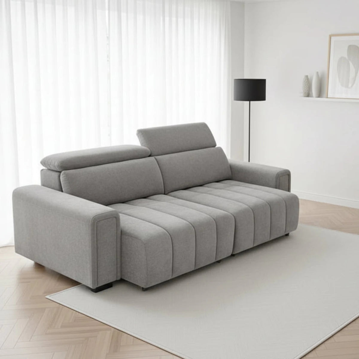 Electric sofabed with independent power sliding seat system.