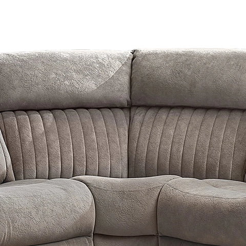 Close-up of a Taupe corner upholstered sofa section with ribbed vertical channel tufting on the backrest and seat cushions.