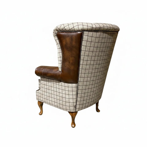 Oswald and Pablo Mulberry beige check wing chair with antique tan leather