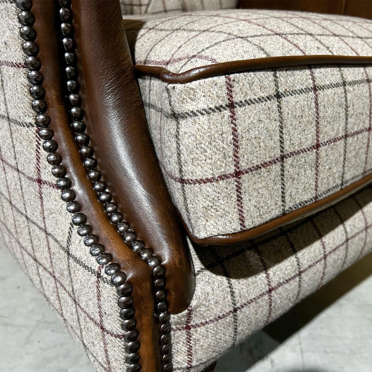 Beige Check & Tan Leather Wing Chair seat close up
