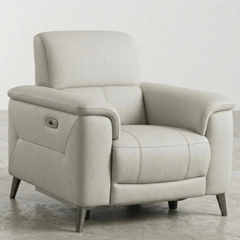 Comfortable recliner armchair with coil sprung foam seating.