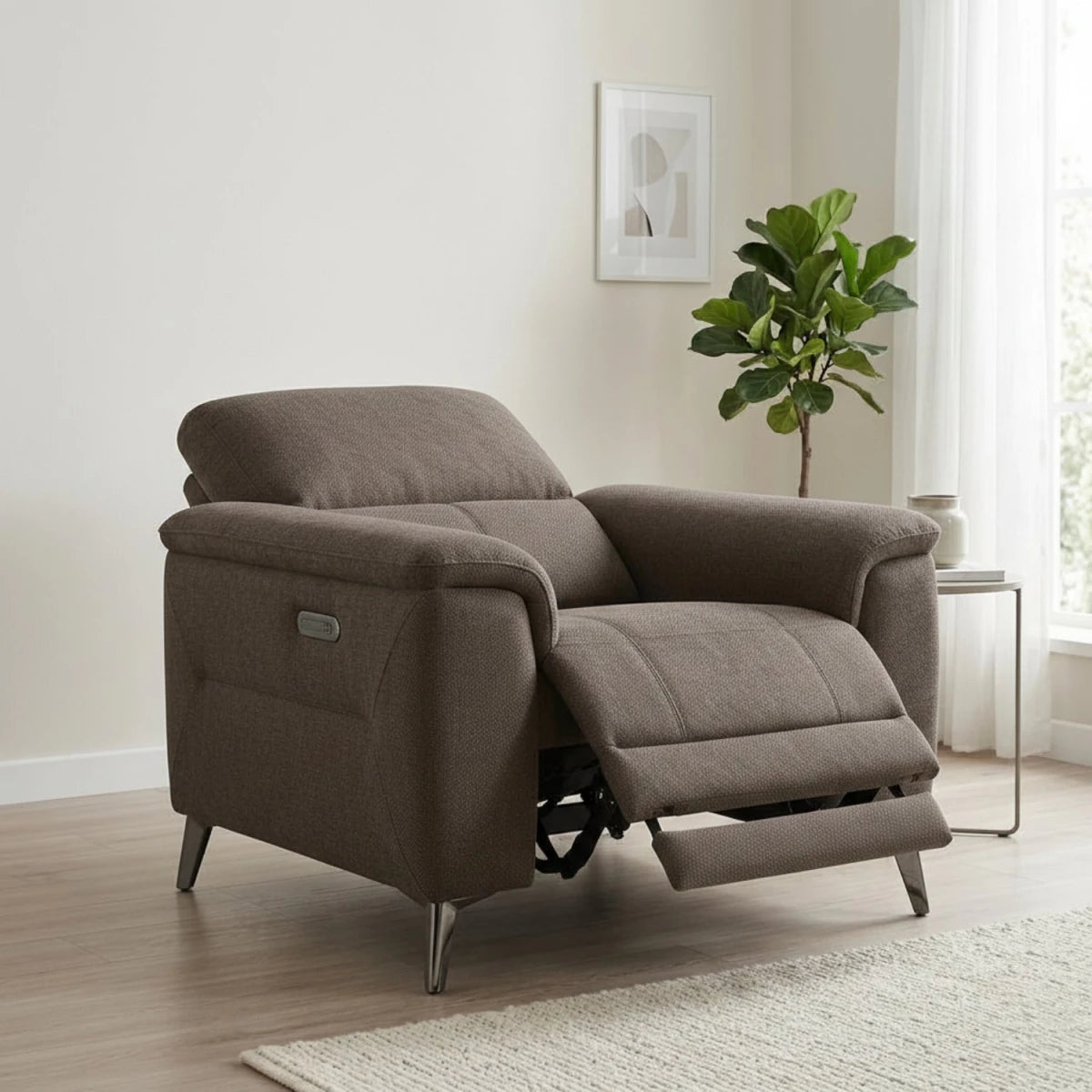 Stylish single recliner chair with power function and padded arms.
