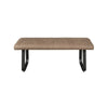 A modern backless dining bench with a quilted taupe-brown upholstered seat and black metal legs, shown against a plain white background.