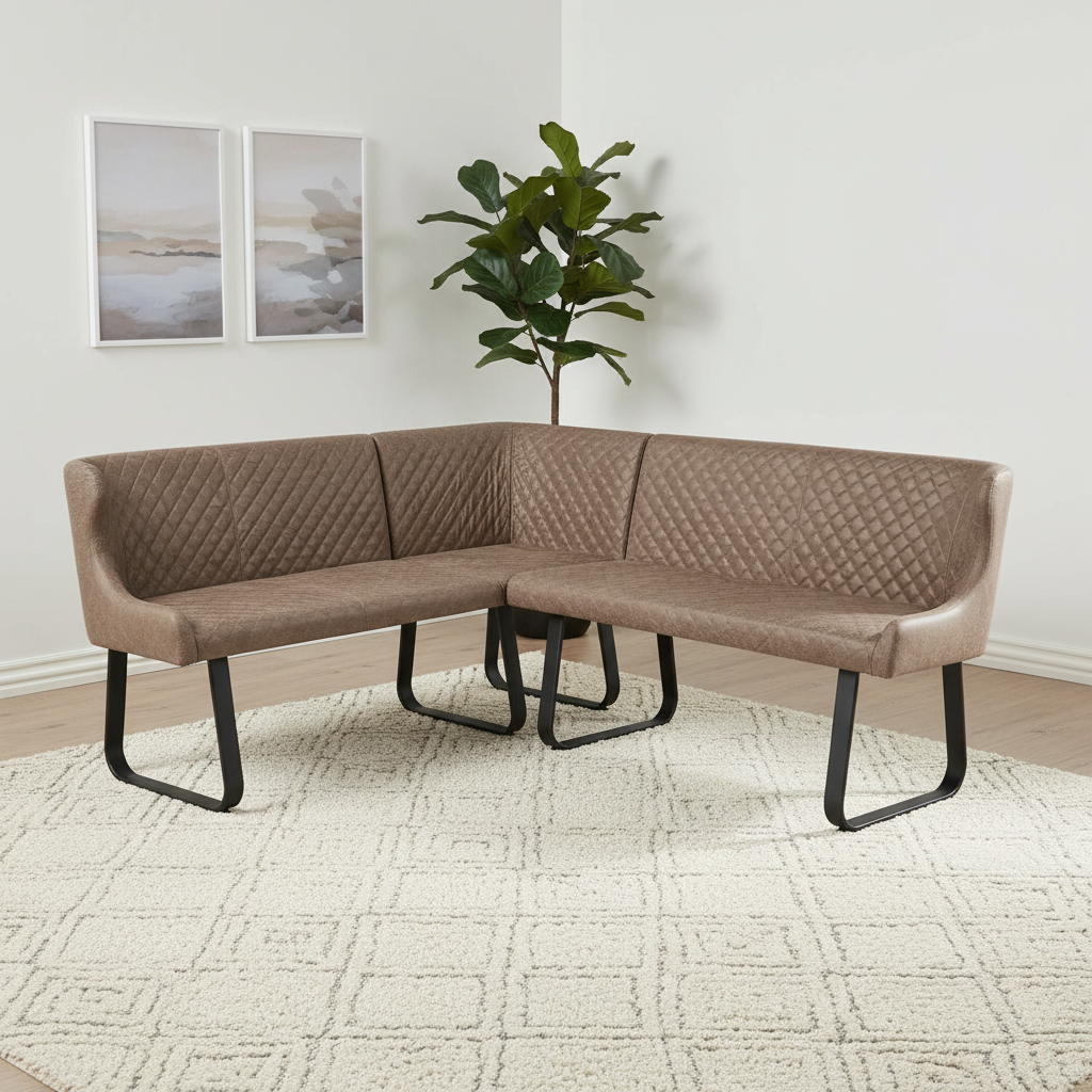 An L-shaped corner upholstered Earth dining bench with quilted backrests and black metal legs, shown in a bright room with a rug, plant, and framed wall art.